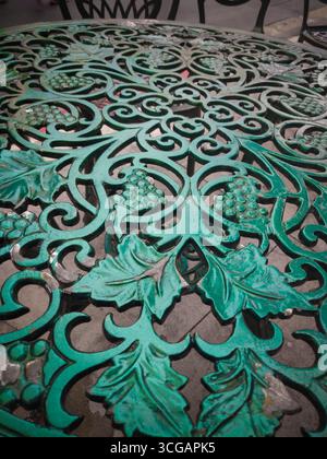 Beautiful green patterned table surface with artistic textures, elegant design, and decorative style, perfect for interiors, backgrounds, or creative Stock Photo
