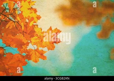 Autumn leaves over vintage background. Perfect grunge fall texture. Stock Photo