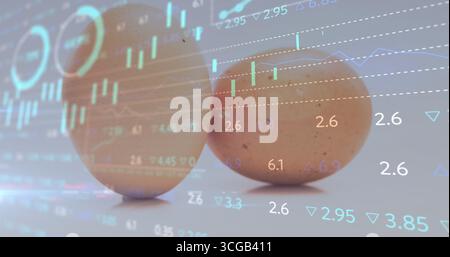 Resting two brown eggs on white tabletop showing faint financial overlay, with candlestick patterns Stock Photo