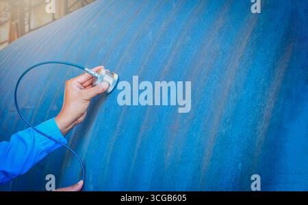 Inspector use ultrasonic testing machine for inspection defect in steel ...