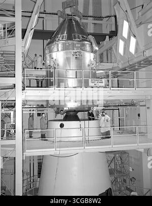 The Apollo 11 Command/Service Module (CSM) are being mated to the Saturn V Lunar Module Adapter.Command Module Service Module CSM Apollo 11 Lunar Module Adapter Stock Photo