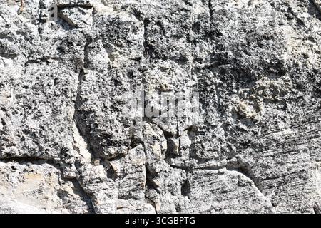Limestone rock face, light color, sedimentary rock. In the mountains of the Simbruini Mountains Park, Italy. Stock Photo