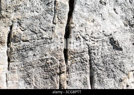 Limestone rock face, light color, sedimentary rock. In the mountains of the Simbruini Mountains Park, Italy. Stock Photo
