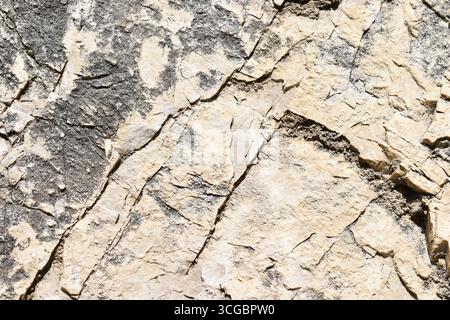 Limestone rock face, light color, sedimentary rock. In the mountains of the Simbruini Mountains Park, Italy. Stock Photo