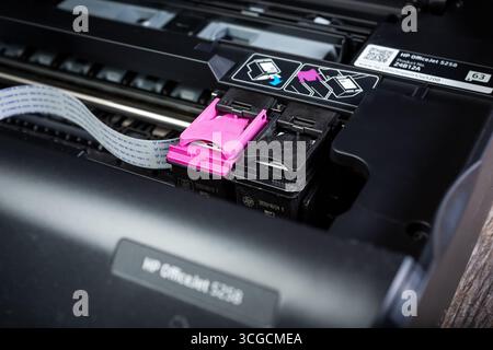 Los Angeles, California, United States - 04-30-2020: A view inside an HP brand printer featuring the ink cartridge ports. Stock Photo