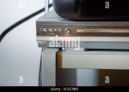 Los Angeles, California, United States - 05-07-2020: A closeup view of an Oppo DVD player, featuring the red power light indicator that is always on. Stock Photo