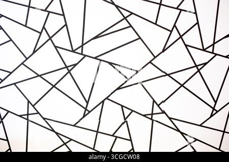 A view of a wall of abstract triangles, as a background image. Stock Photo