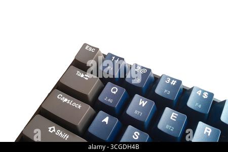 Detailed close-up of a modern mechanical keyboard, featuring stylish two-tone blue and gray keycaps. Ideal for gamers, tech enthusiasts, and professio Stock Photo