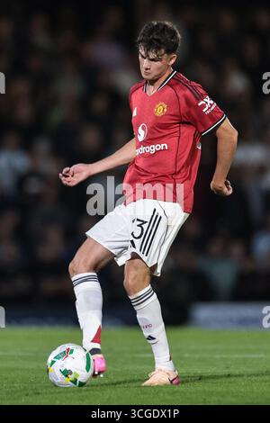 Tyler Fredricson of Manchester United with the ball during the Carabao