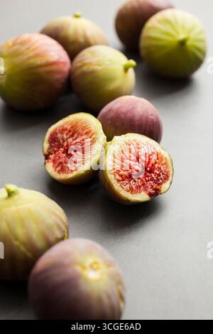 Fresh figs placed on dark table. Stock Photo