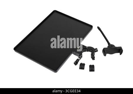 A flat lay shot of a black laptop tray with a detachable phone holder. Stock Photo