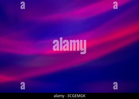 Swirling patterns of vibrant pink and blue create a captivating abstract background, showcasing smooth transitions and a lively atmosphere. Ideal for Stock Photo