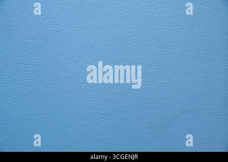 Texture of the surface of blue natural leather, close-up. Stock Photo