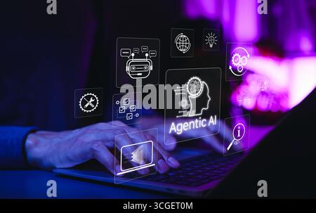 Agentic AI and Intelligent Automation Technology Concept. Typing on laptop with icons representing agentic AI, advanced artificial intelligence, Stock Photo