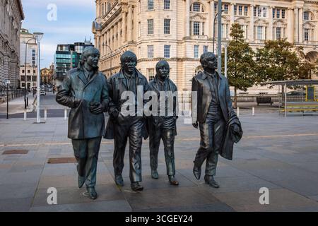 Port of Liverpool, Beatles Statue, designed by sculptor Andy Edwards It consists of four bronze statues of the Beatles Stock Photo