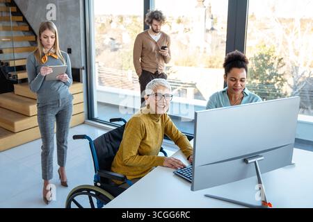 Programmers cooperating at IT company developing apps. People business work office concept Stock Photo