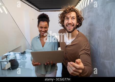 Artificial intelligence, programming innovation. Teamwork with laptops for future solutions Stock Photo