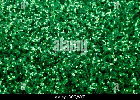 Full frame macro abstract texture background of sparkling green color glitter surface with copy space Stock Photo