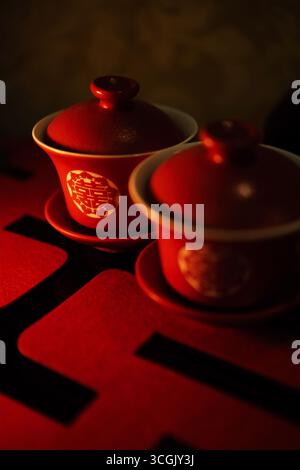 Chinese Wedding Tea Ceremony Detail: Red Double Happiness Gaiwan Teacups Stock Photo