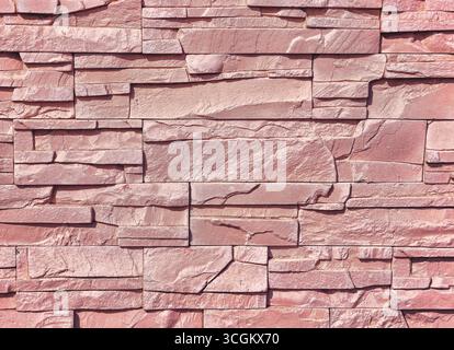 Textured Pink Stone Wall Background - High-Resolution Rustic Design for Digital Backdrops, Photography, Web Design, Marketing Materials, and Engaging Visuals for Creative and Commercial Use Stock Photo
