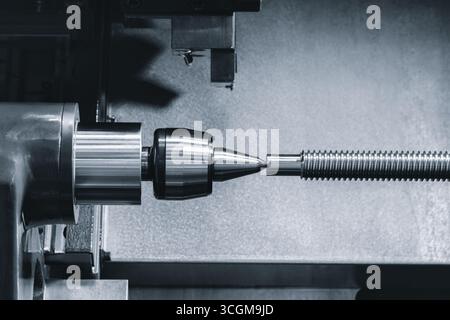 Metal machine tools industry. CNC turning machine high-speed cutting is operation. Stock Photo