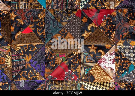 Detail patchwork quilt in street market. Bali island, Ubud, Indonesia. Close up patchwork blanket texture Stock Photo