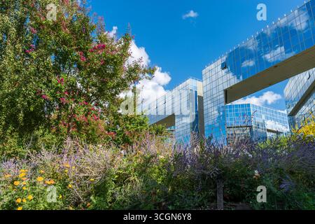 Paris, France - 08 28 2025 : the Le Ponant building, occupied by the Prefecture of Ile-de-France, in the André Citroën park Stock Photo