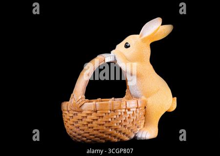 wicker rattan basket on black background Stock Photo