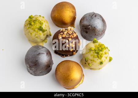 different chocolates on a white background Stock Photo
