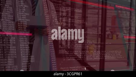 Viewing suited professional analyzing reflected code on glass wall in office with blinds binders Stock Photo
