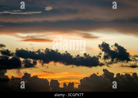 Miami Florida,sky clouds weather,storm line horizon climate change global warming sunset evening,cloud formations horizontal layers black silhouettes Stock Photo