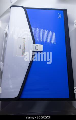 Durable blue document folder with white flap on white background Stock Photo