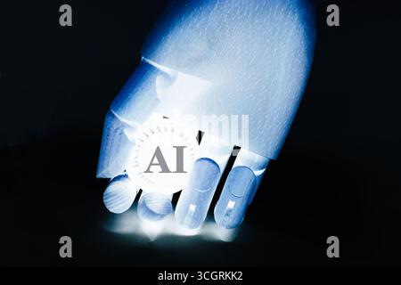 Robot hand showing the letters "Ai" . Artificial intelligence concept. Stock Photo