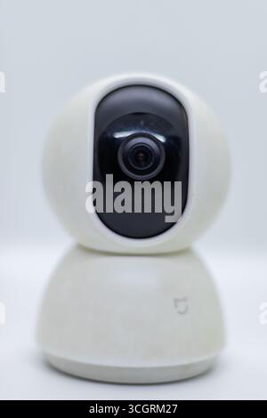 Modern CCTV security camera closeup on white background Stock Photo