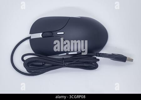 Standard Black Wired Computer Mouse with Silver Trim on Clean White Background Stock Photo