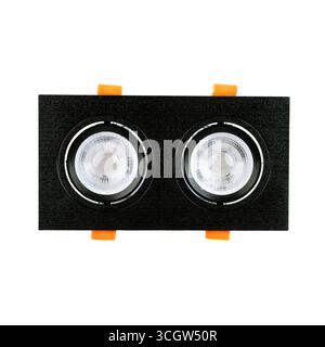 Modern recessed ceiling light fixture with two MR16 GU5.3 lamp holders, rectangular black frame and orange mounting clips, isolated on white backgroun Stock Photo