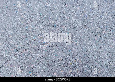 Full frame macro abstract texture background of sparkling silvery white glitter surface with copy space Stock Photo