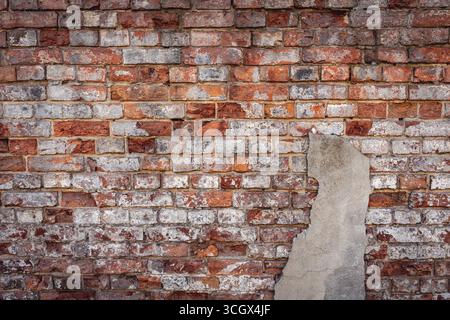 Close up on an old wall made of red bricks Stock Photo