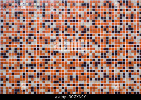 Background from a wall made of colorful mosaic tiles Stock Photo