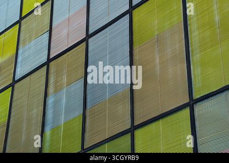 Yellow, white and brown blinds in an office building Stock Photo