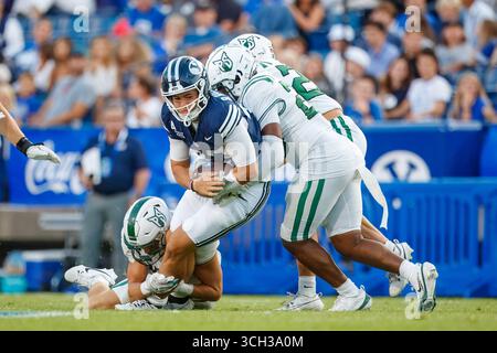 BYU quarterback Bear Bachmeier (47) greets fans after winning a NCAA