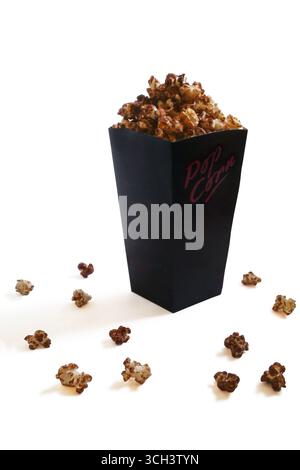 Black box of chocolate flavoured popcorn isolated on a white background. Stock Photo
