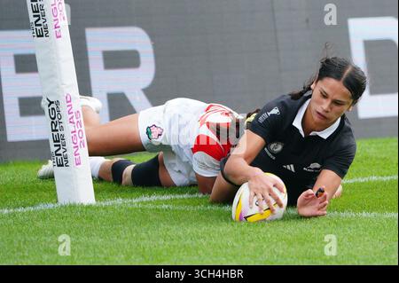New Zealand's Braxton Sorensen-McGee, centre, celebrates after scoring ...