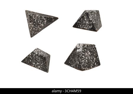 Chocolate candies in the form of precious stones, with marble texture, isolated on a white background. Stock Photo