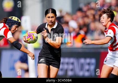 New Zealand's Braxton Sorensen-McGee walks with a child after the Women ...