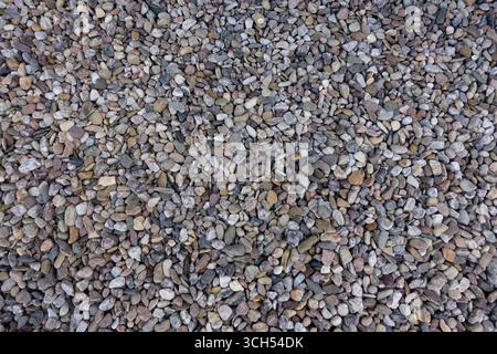 Close up of small gravel stones forming a textured natural background Stock Photo