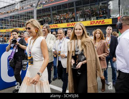 ZANDVOORT - Queen Maxima, Princess Amalia, and Princess Alexia on the grid before the Dutch Formula 1 Grand Prix at the Zandvoort Circuit. ANP SEM VAN DER WAL Stock Photo