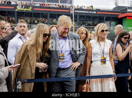 ZANDVOORT - Princess Amalia, King Willem-Alexander, Princess Alexia, and Queen Maxima on the grid before the Dutch Formula 1 Grand Prix at the Zandvoort Circuit. ANP SEM VAN DER WAL Stock Photo