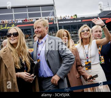 ZANDVOORT - Princess Amalia, King Willem-Alexander, Princess Alexia, and Queen Maxima on the grid before the Dutch Formula 1 Grand Prix at the Zandvoort Circuit. ANP SEM VAN DER WAL Stock Photo