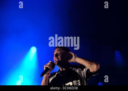 Jedburgh, UK. 31st Aug, 2025. Example performs onstage during day two of EdgeFest 2025 at Lilliardsedge near Jedburgh on August 30, 2025. EdgeFest 2025, Music Festival. A growing music festival, in the Scottish Borders, now in its third year, being held at Lilliardsedge, near Jedburgh. Music and entertainment for all the family, under the big top. ( Credit: Rob Gray/Alamy Live News Stock Photo